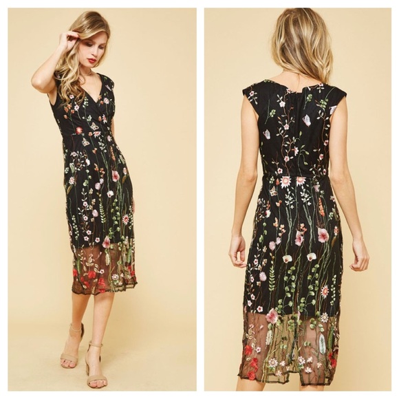 black dress with floral overlay